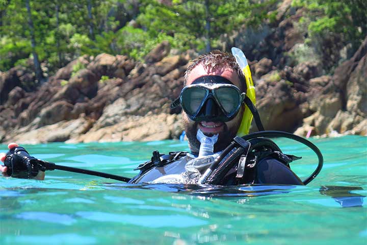 Scuba Diver Surfacing in the Whitsunday Islands